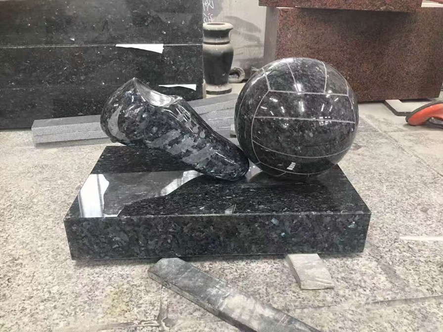 Stone Football Carving